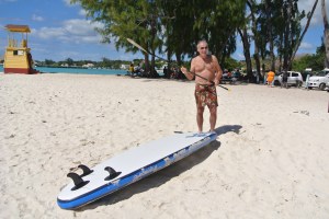 Dad prepares to do some paddle-boarding