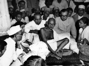 Gandhi sitting with Khalifat Movement activists