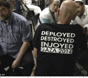 A man purported to be a "reservist" is photographed at a bar in Jerusalem (screenshot)