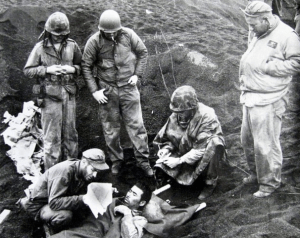 Americans on Iwo Jima with a Japanese survivor of the battle. Good PR here?
